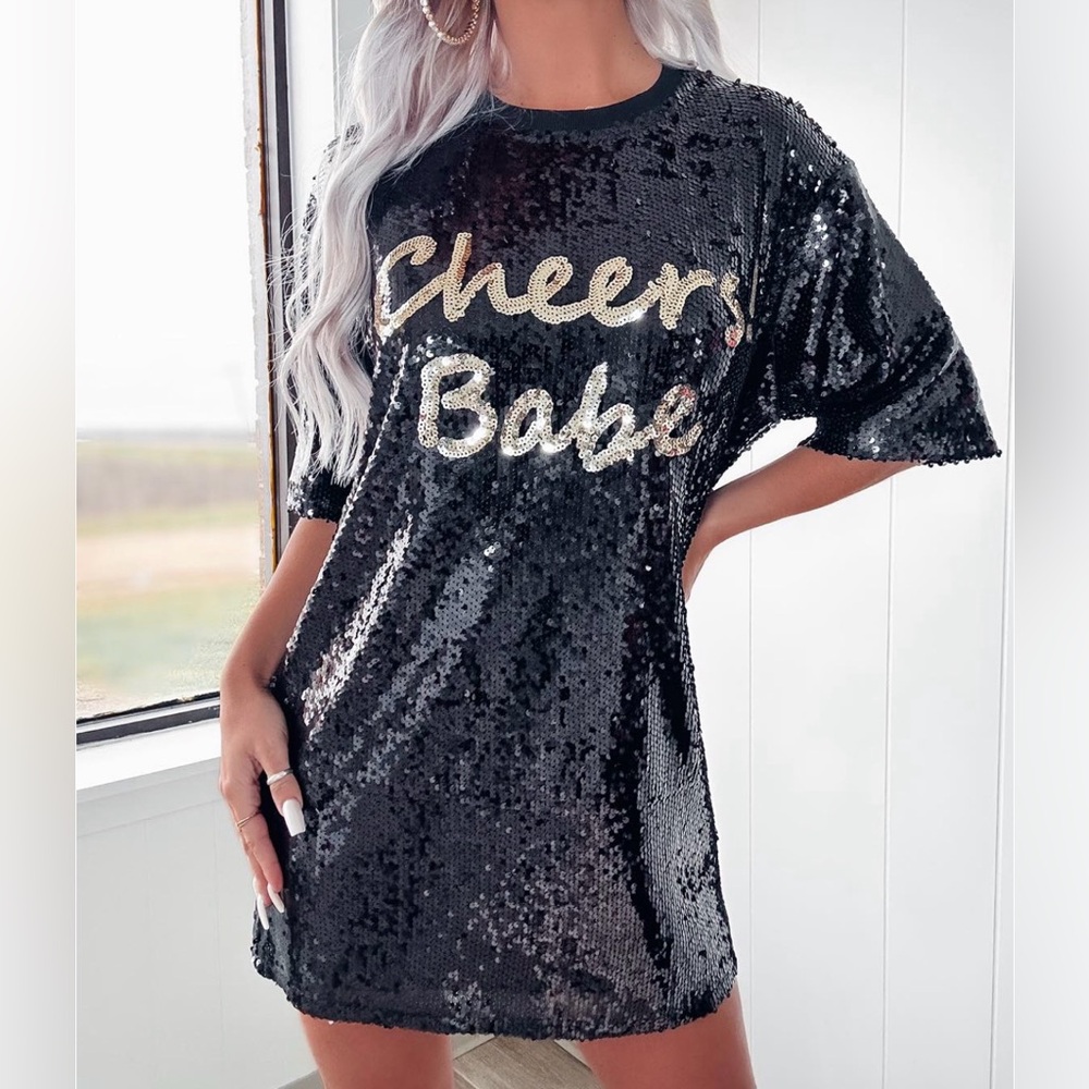 New Sunday Edition a black sequin embellished dress